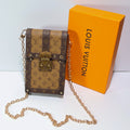 LV Vertical Trunk Pochette Crossbody Bag